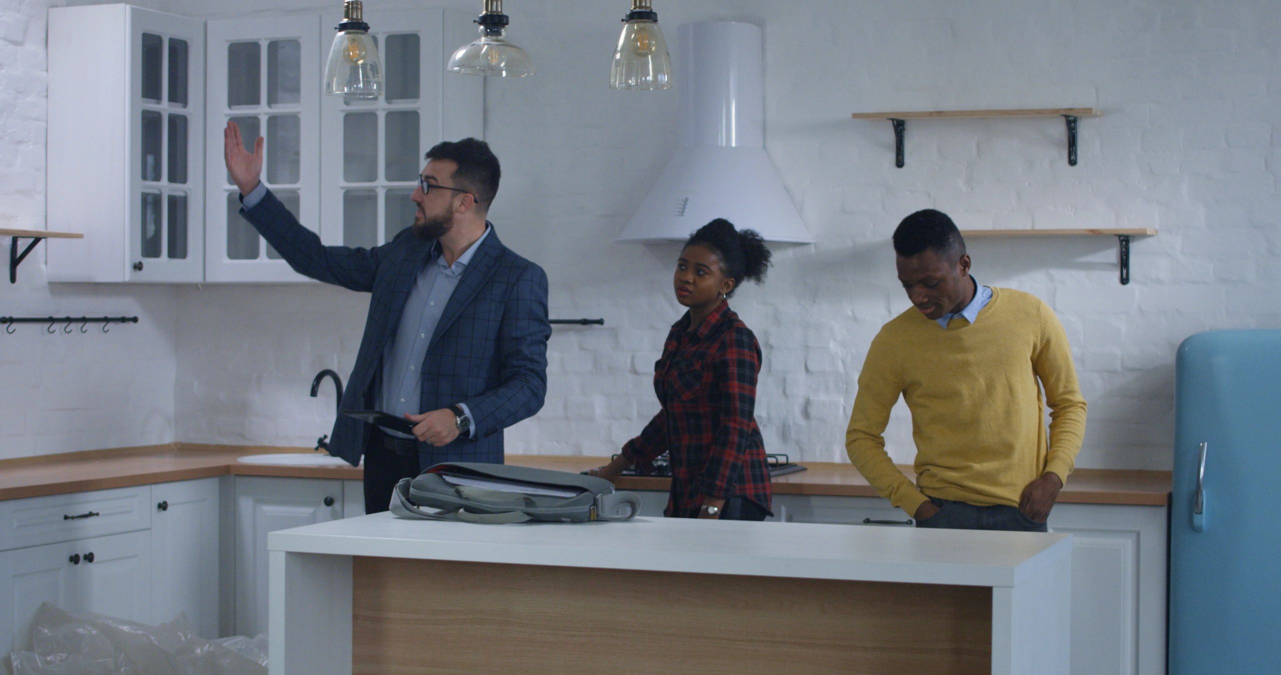 Homeowners reviewing a residential project with a professional