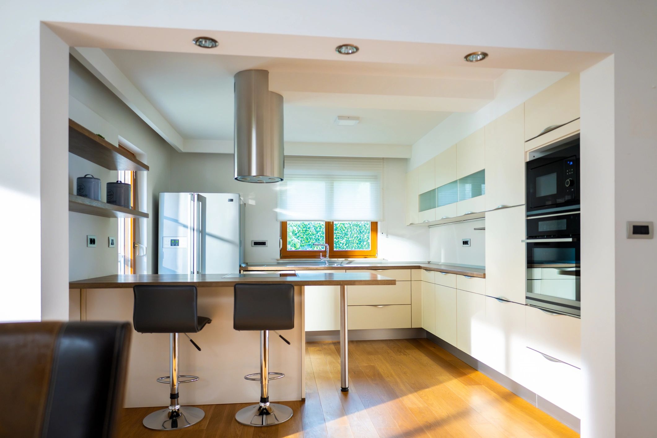 Modern renovated kitchen with wood flooring