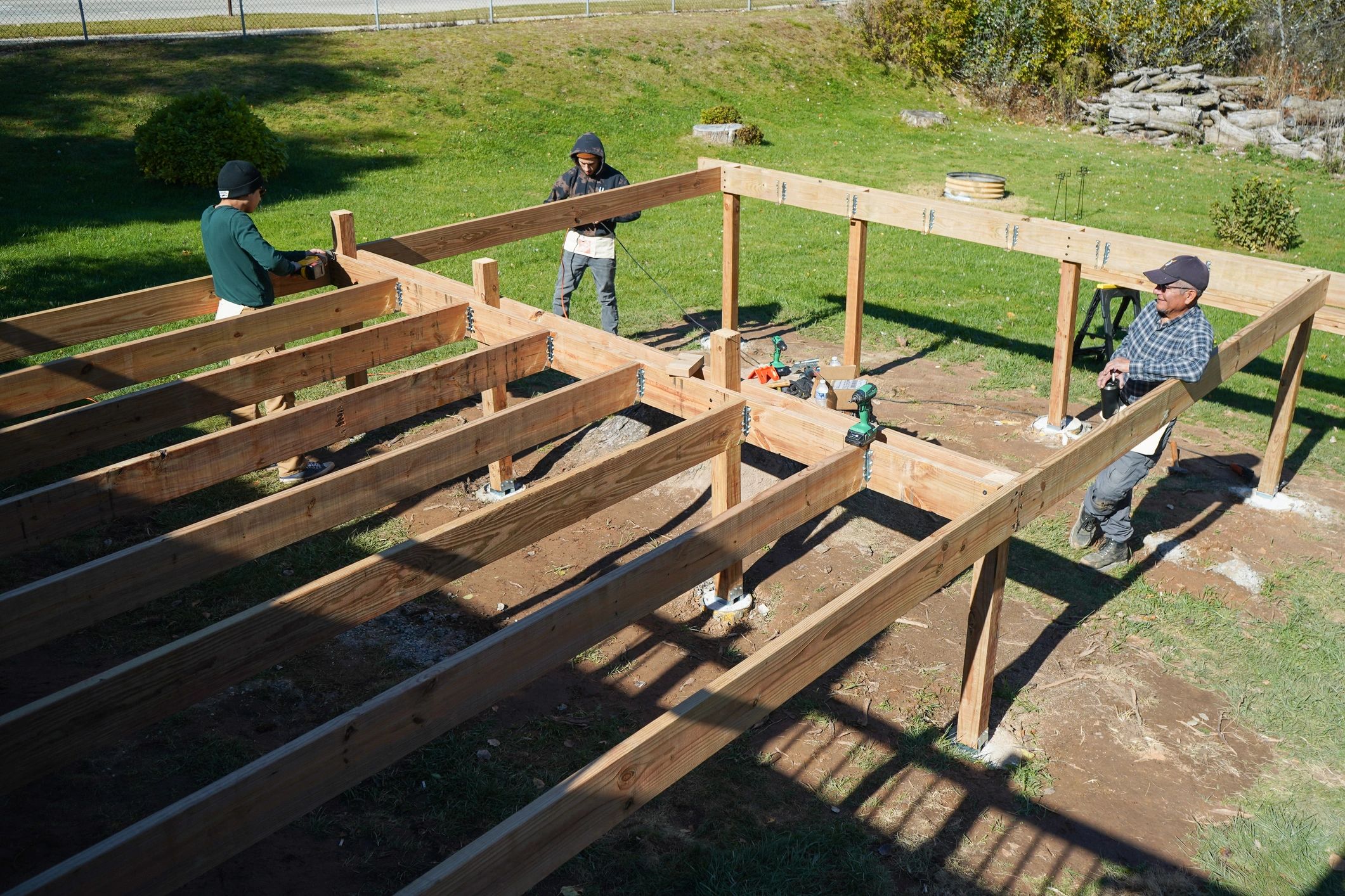 Contractors building a residential deck