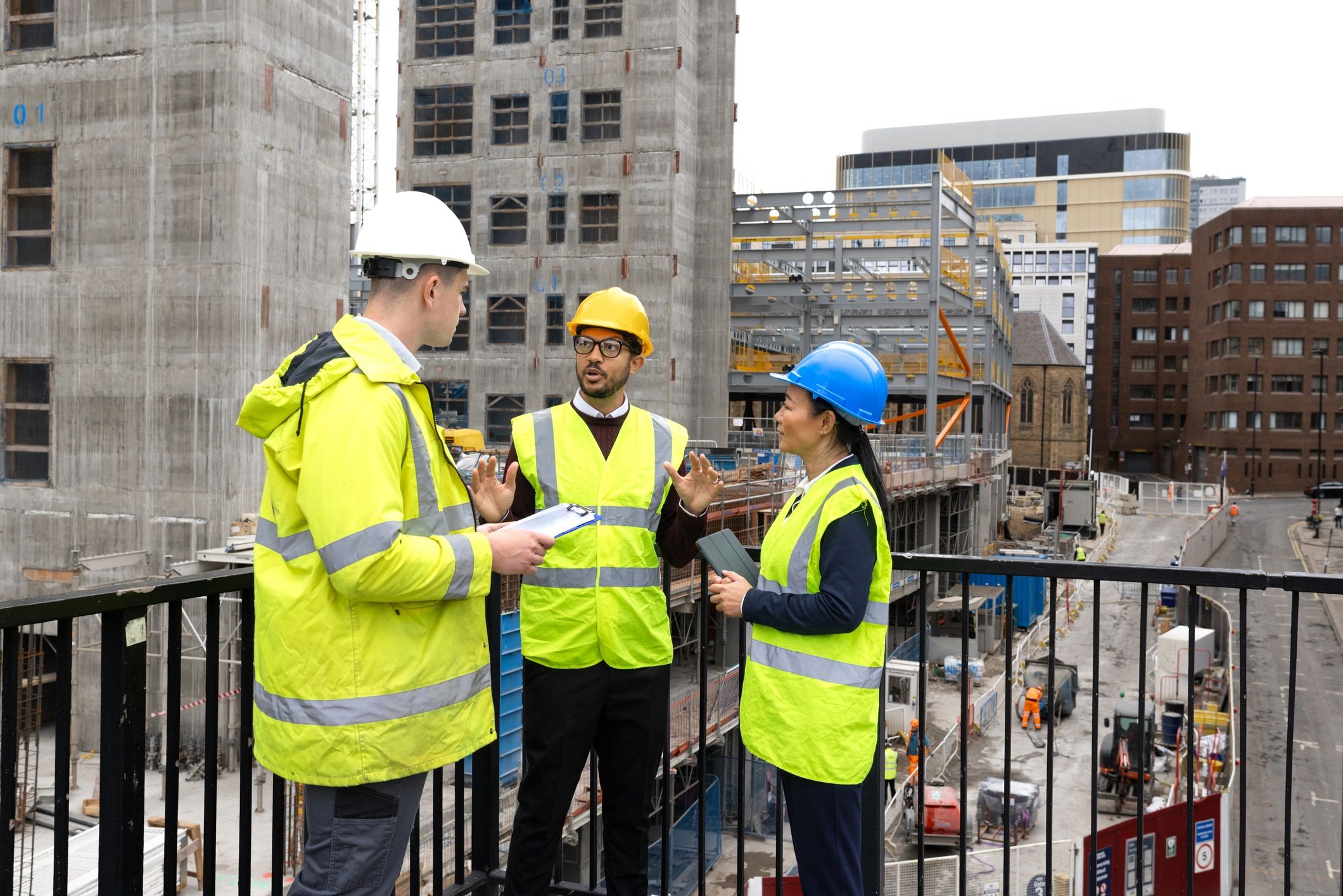 PowerHouse General Contracting team reviewing plans on a job site