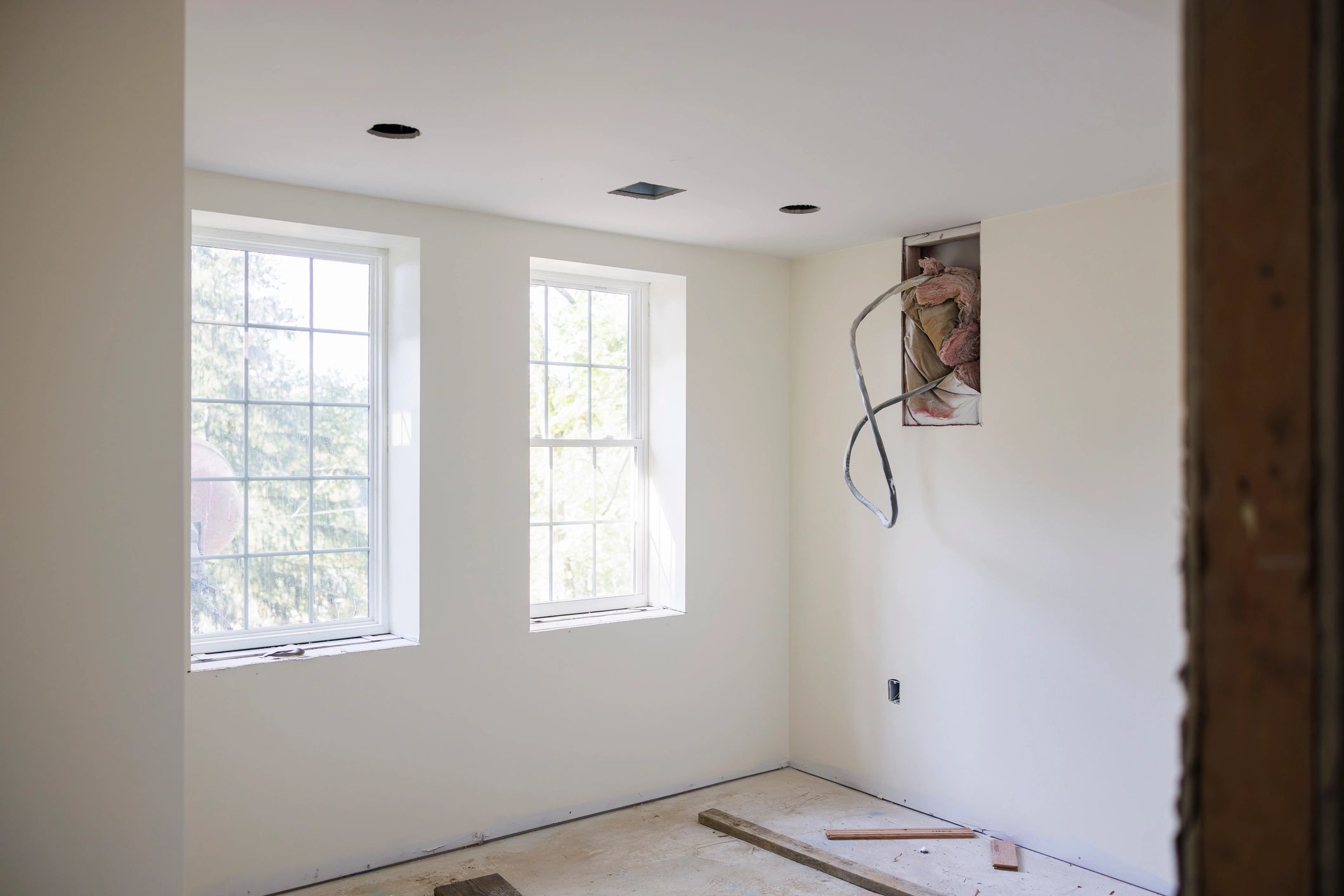Renovated room with bright windows